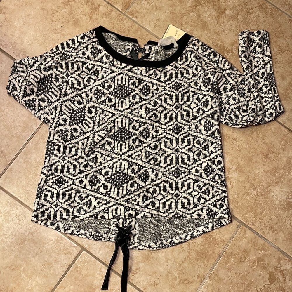 Black and white faux leather lace back top